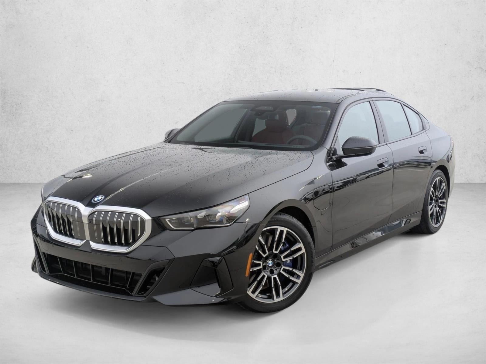 2026 BMW 5 Series 550e xDrive Sedan's photo